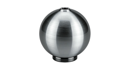 Silver metal sphere atop a small circular base on a black background; surface scratches visible