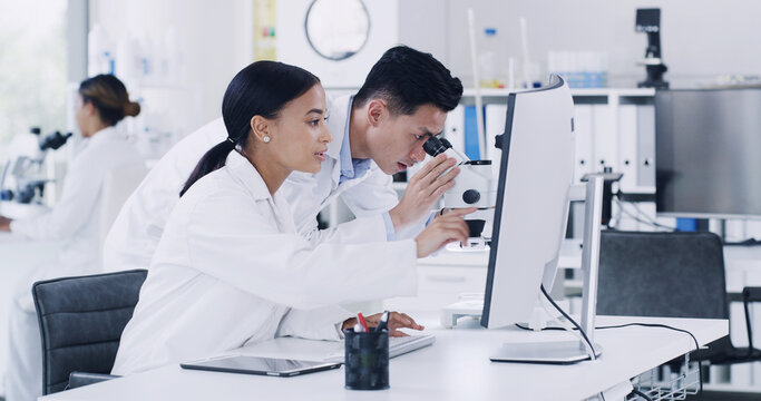 Medical, team or people in lab with microscope, test or examination for vaccine development. Collaboration, desktop or scientist in clinic with equipment, analysis or research in pharmaceutical study