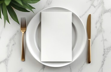 Blank menu card on white plate with gold cutlery. The design features a top view with copy space for restaurant food menu template. Dining table setup with elegant style