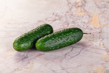Ripe green raw two cucumbers