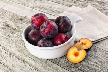 Ripe sweet juicy plum heap