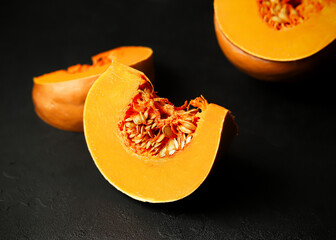 slice of pumpkin on dark fabric 