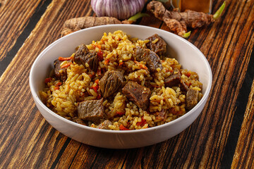 Asian traditional pilaf with beef