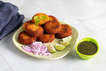 "Dahi ke kebab", a creamy, spiced yogurt patties mixed with herbs and breadcrumbs, shallow-fried to golden perfection, soft inside, crisp outside.

