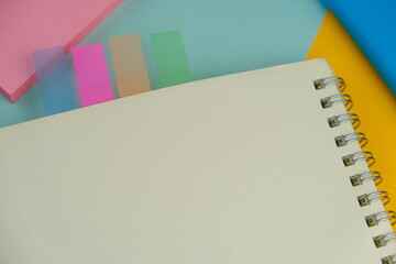 blank paper next to school tools with no word as a template for text space concept. business and education concept