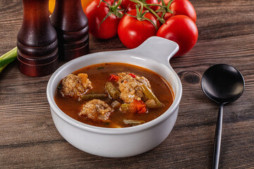 Tomato Soup with meatballs and vegetables