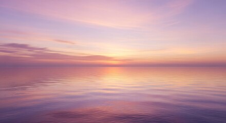 Fototapeta premium Calm Ocean at Sunset - A serene view of the ocean reflecting the colors of the sunset sky. Soft pastel hues create a tranquil and peaceful atmosphere