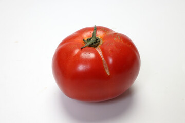 fresh ripe red maroon variety tomato beef breakfast on white background