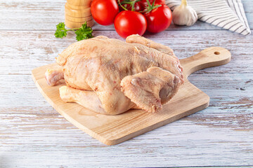 Raw whole uncooked organic chicken