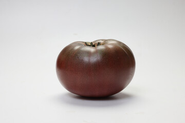 fresh ripe red maroon variety tomato beef breakfast on white background