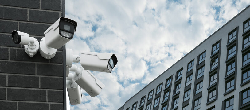 Surveillance camera installed on a repeating pattern facade, blending geometry, control and the aesthetics of urban security. banner. Copy space