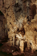 Limestone Cave Wall with Stalactites, Stalagmites and Textured Flowstone