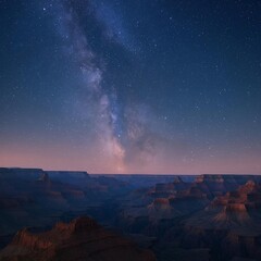Majestic Grand Canyon landscape at night under a brilliant starry sky with the visible Milky Way galaxy