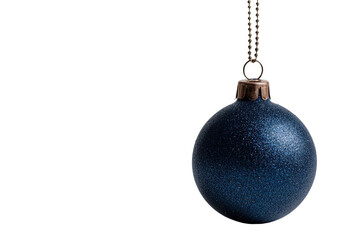 A single, sparkling blue Christmas ornament hangs against a stark black background