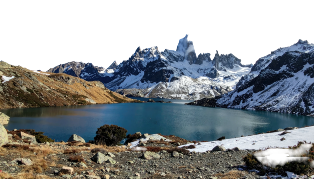 Still, turquoise lake mirroring snowy peaks in a mountain range - Powered by Adobe