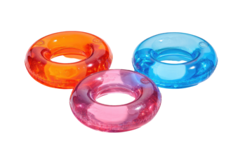 Three vibrant, transparent inflatable rings, arranged in a playful cluster on a black background