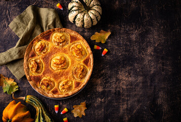 Halloween apple pie with scary faces