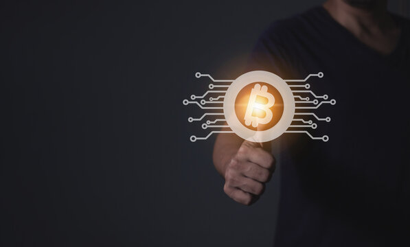 Young man using smartphone hand touching to trade cryptocurrencies online, Investors in cryptocurrencies and bitcoin coins online