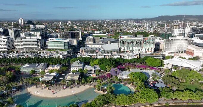 4K Aerial circular panning tracking motion of west side Brisbane CBD known as South Bank Precinct with a new pedestrian bridge called The Neville Bonner Bridge, Brisbane, QLD, Australia