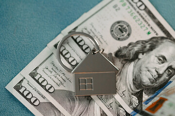 Real estate concept. House and dollar bill
