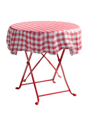Round red table with gingham tablecloth against black background