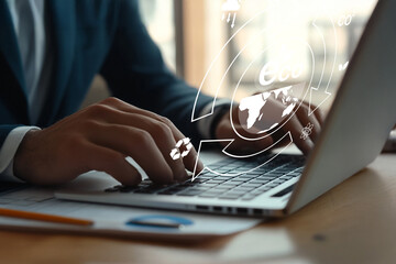 Professional Businessman Engaging with Technology while Using Laptop in Modern Office Environment with Graphics Overlay Representing Connectivity and Data