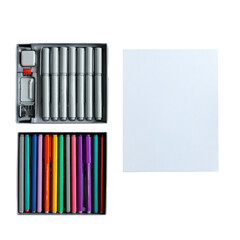 Markers in boxes, gray and colored, beside blank white paper