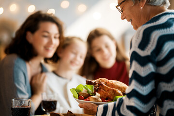 Family celebrating Thanksgiving Day