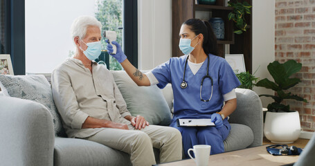 Home, covid and nurse with old man, thermometer or healthcare with virus prevention. Pensioner,...