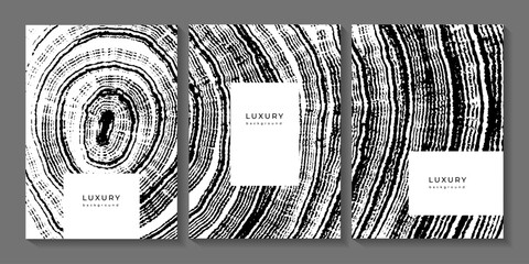 Collection of black and white templates with wooden stump texture. Backgrounds with grunge wood imprint. Annual tree rings. Organic eco background. Templates for business cards, cover