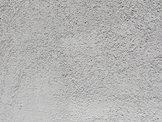 Light gray rough plaster wall texture background