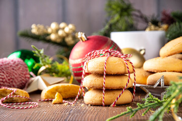 Stack of shortbread sugar cookies with Christmas decorations