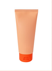 Peach colored plastic tube with cosmetic product and bright orange cap isolated vertically on transparent background, convenient container for cosmetics, skin care products, headline mockup