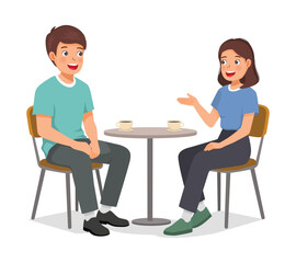 Fototapeta premium Two people talking sitting at table in cafe having conversation between man and woman