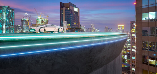 3d rendering futuristic electric car charging on building rooftop at dusk