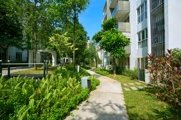 Modern apartment buildings with green park and outdoor exercise area