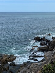 rocky seaashore in cloudy weather