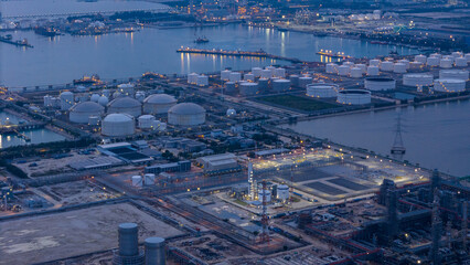 LNG (Liquified Natural Gas) tanker anchored in Gas terminal gas tanks for storage. Oil Crude Gas Tanker Ship. LPG at Tanker Bay Petroleum Chemical or Methane freighter export import transportation