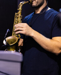 Fototapeta premium Musician Playing Brass Saxophone Close-up