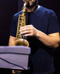 Fototapeta premium Musician Playing Brass Saxophone Close-up