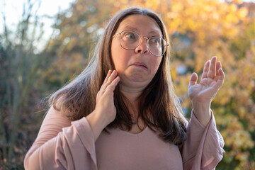 Astonished woman, Female face with silly expression and funny mimic, strong facial surprise and...