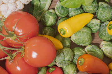 Close-up of various vegetables in a cozy kitchen setting