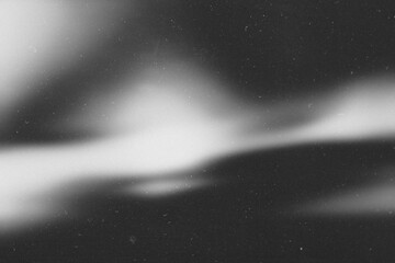 retro film overlay effect with scratch dust and blur light leaks, retro grain noisy film distressed texture light leak flare on black background,abstract black and white background with blur lights