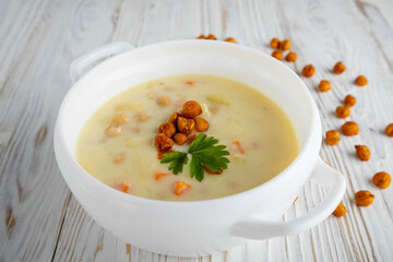 chickpea soup on a rustic white background