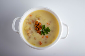 Chickpea soup on a white background. Top view