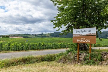 Pouilly Fuisse Vins de Bourgogne sign with rolling vineyards