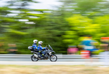 Obraz premium Police officers riding motorcycle on Route de Taulignan, Grignan