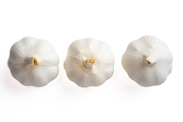 Fresh garlic heads arranged in a minimal composition. Ideal for healthy eating, organic food, and cooking themes. 