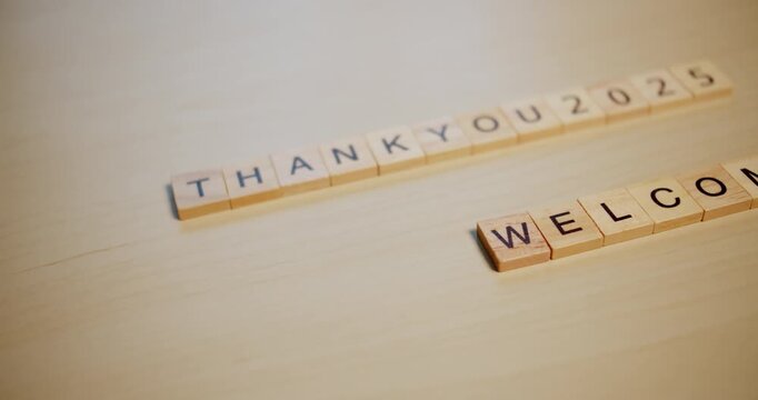 Expressing thanks for past year and welcoming new beginnings with creative text art.