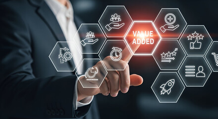 Businessman Touching Virtual Hexagonal Icons for Value Added Concept